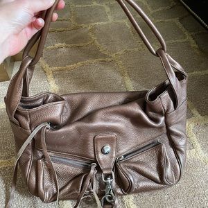 Bronze Botkier shoulder bag.
